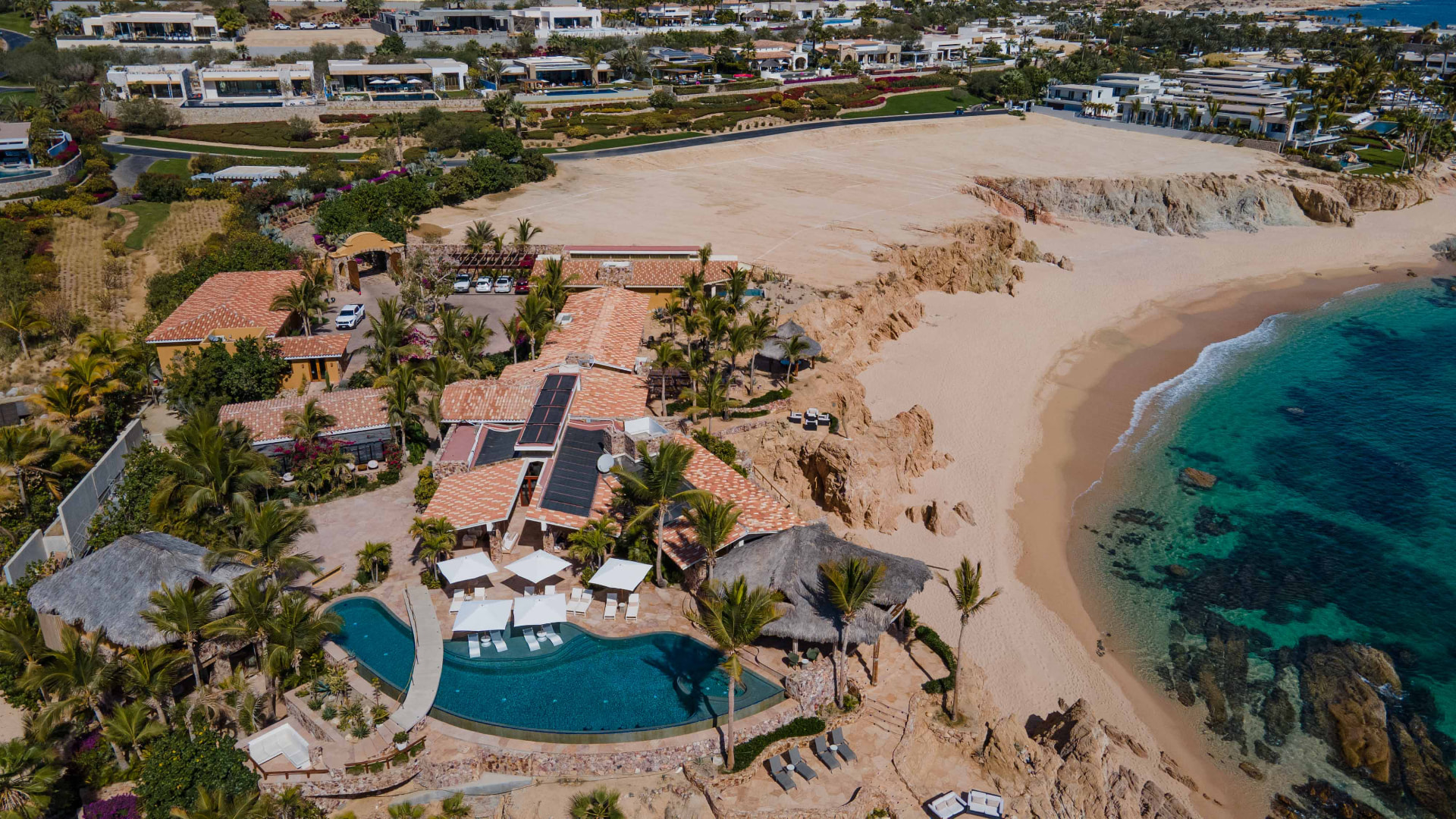 Aerial View of Oceanfront Estate and Pool at Chileno Bay