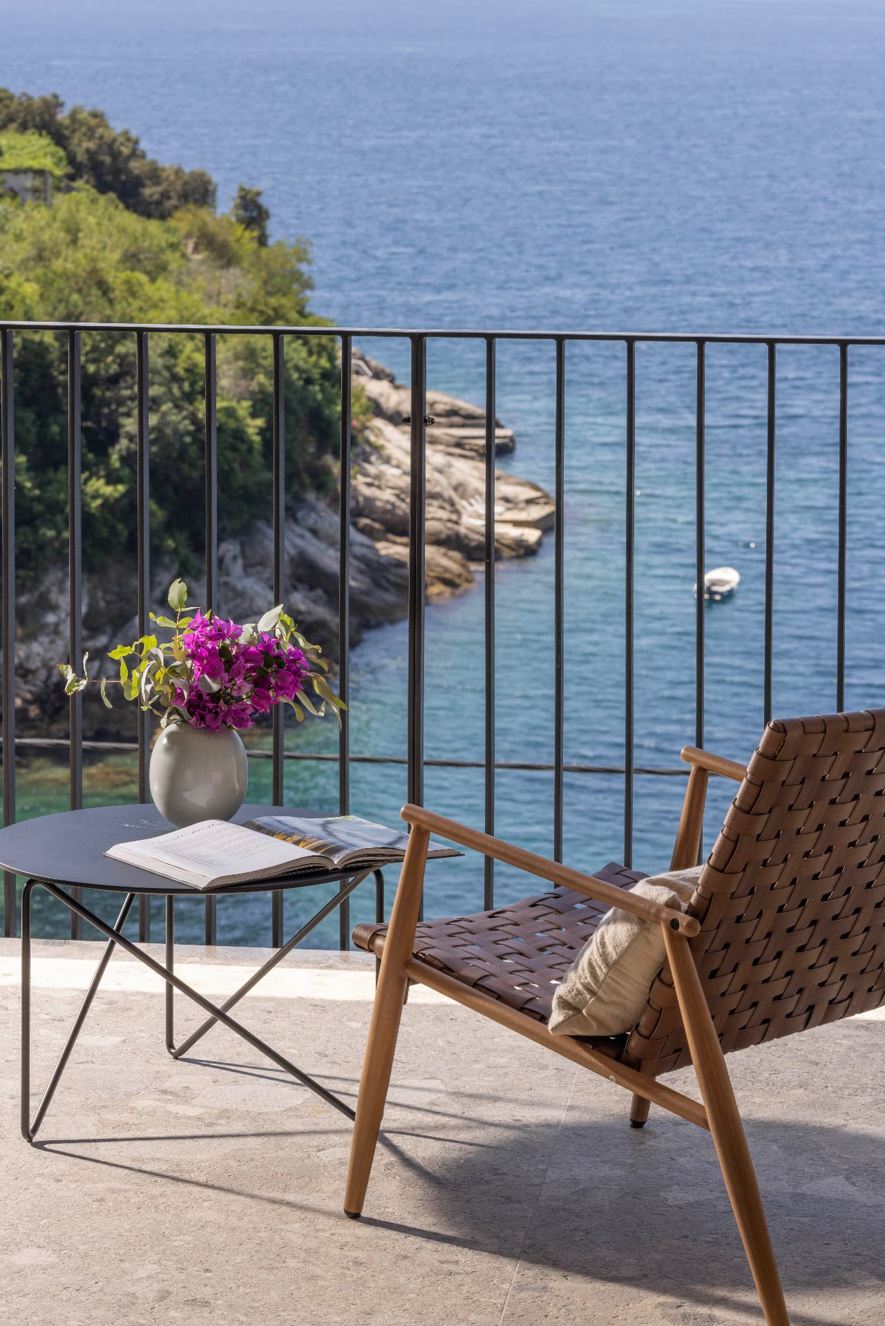 Private Balcony Lounge above the Rocky Shoreline