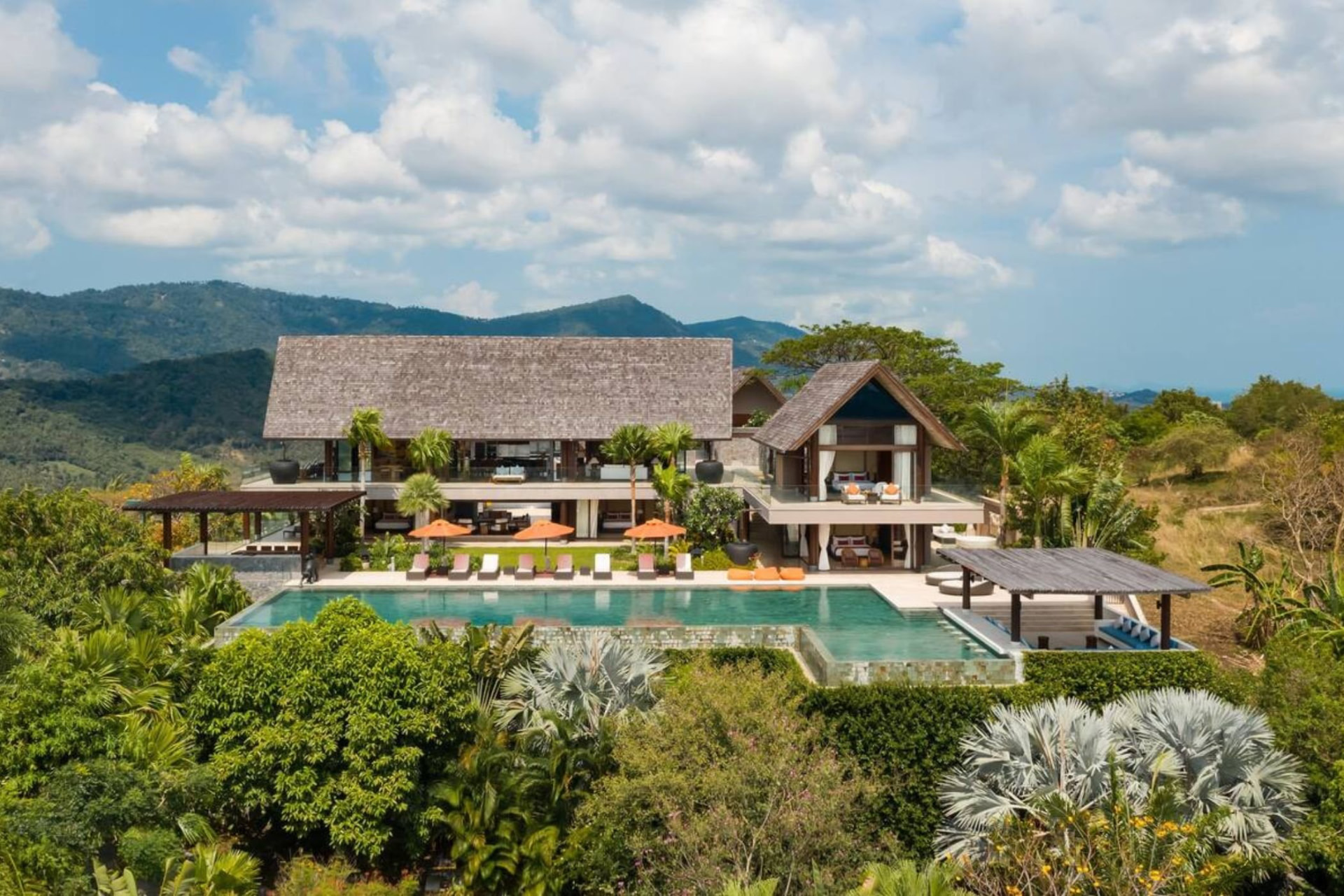 Aerial View of the Hilltop Villa with Infinity Pool and Mountain Backdrop